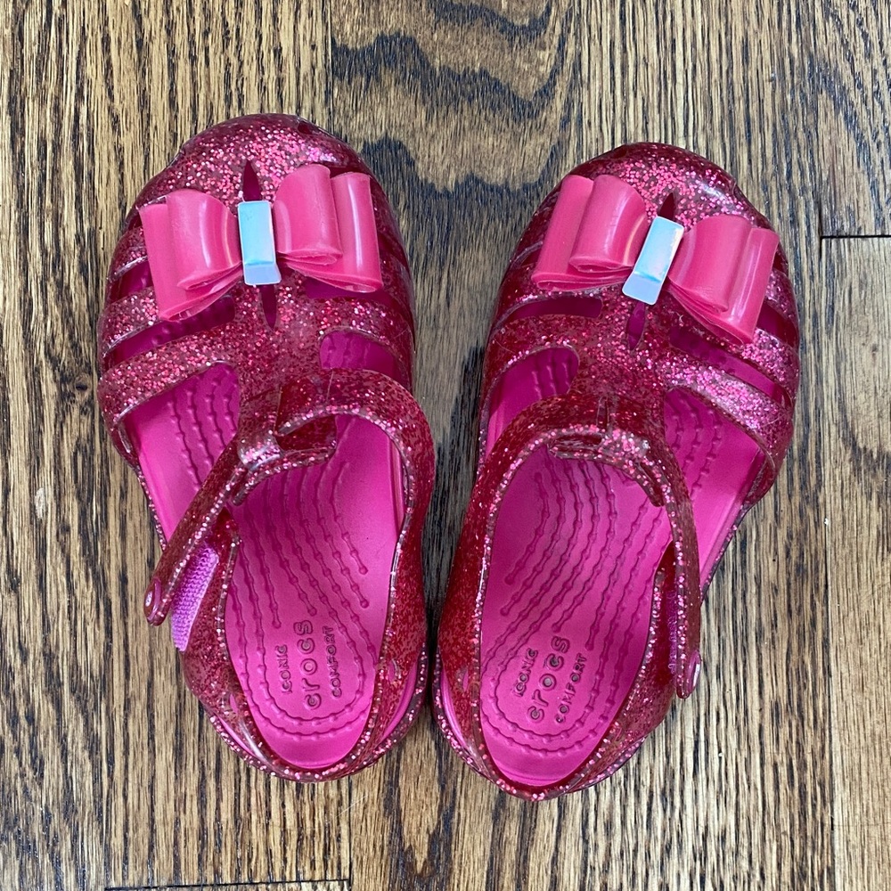 Pink glitter Crocs Isabella bow sandals, size 6. Excellent condition ships quick